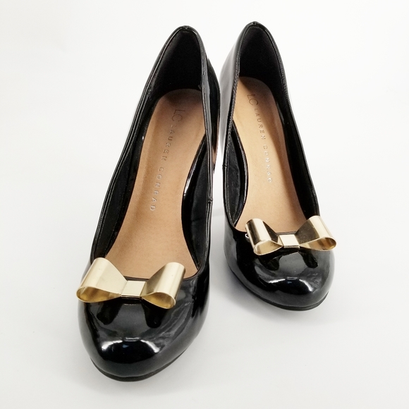 LC Lauren Conrad Shoes - LC Conrad black heels gold bow